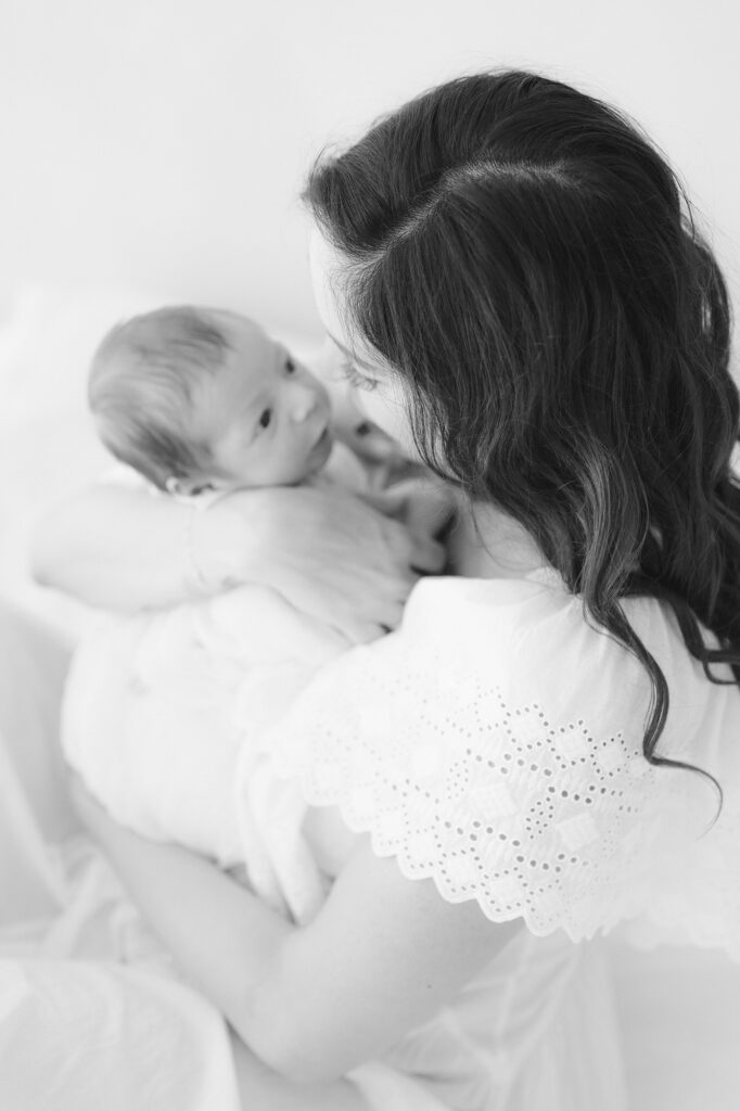 newborn photography studio Westlake Village mother holding newborn baby